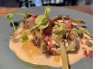 Cœur d’artichaut grillé, crème ajo blanco, huile de truffe, éclats de jambon, huile aromatique